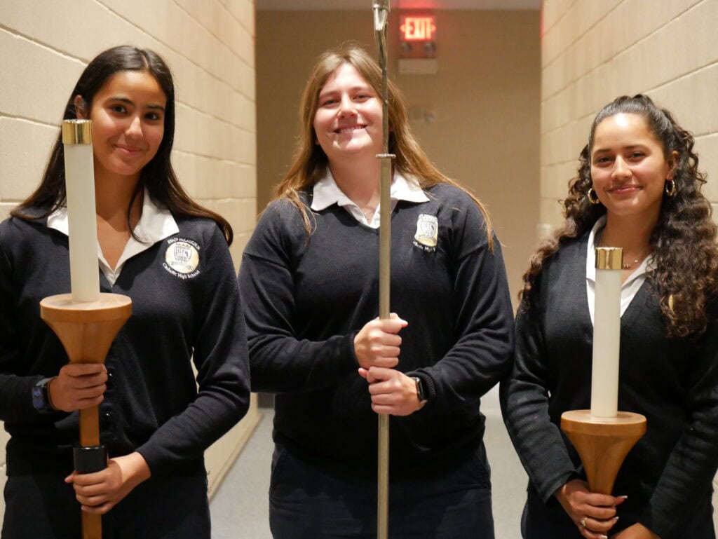 Catholic high school students with candles